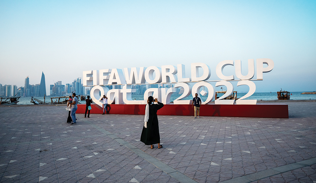 DOHA: Visitors take photos with a FIFA World Cup sign in Doha, ahead of the Qatar 2022 FIFA World Cup football tournament. - AFP