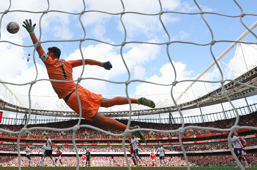 LONDON: Tottenham Hotspur's French goalkeeper Hugo Lloris is beaten by Arsenal's Ghanaian midfielder Thomas Partey for the first goal during the English Premier League football match between Arsenal and Tottenham Hotspur on October 1, 2022. - AFP