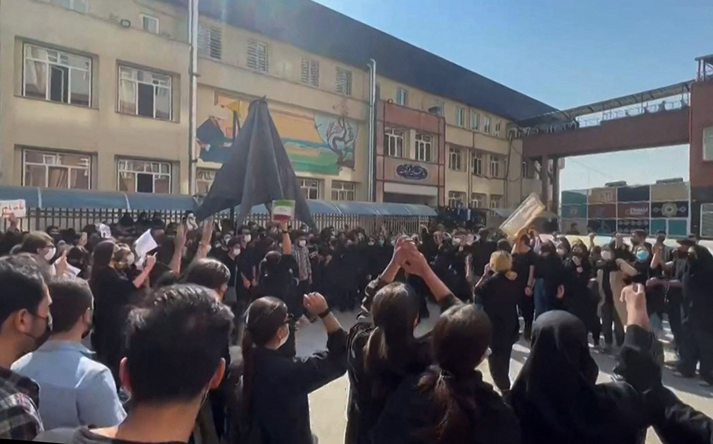 TEHRAN: This image grab from video made available on Oct 15, 2022 shows Iranian students rallying at the University of Science and Culture. – AFP