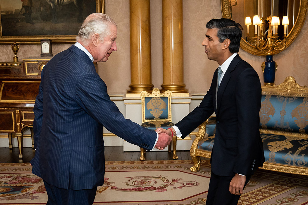 LONDON: Britain's King Charles III greets incoming Prime Minister Rishi Sunak during an audience at Buckingham Palace on Oct 25, 2022. - AFP