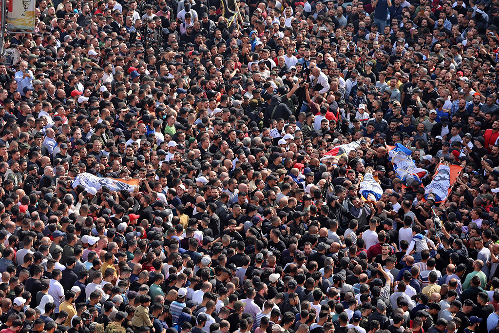 NABLUS: Mourners attend the funeral of Palestinians killed in an overnight Zionist raid in this occupied West Bank city on Oct 25, 2022. – AFP