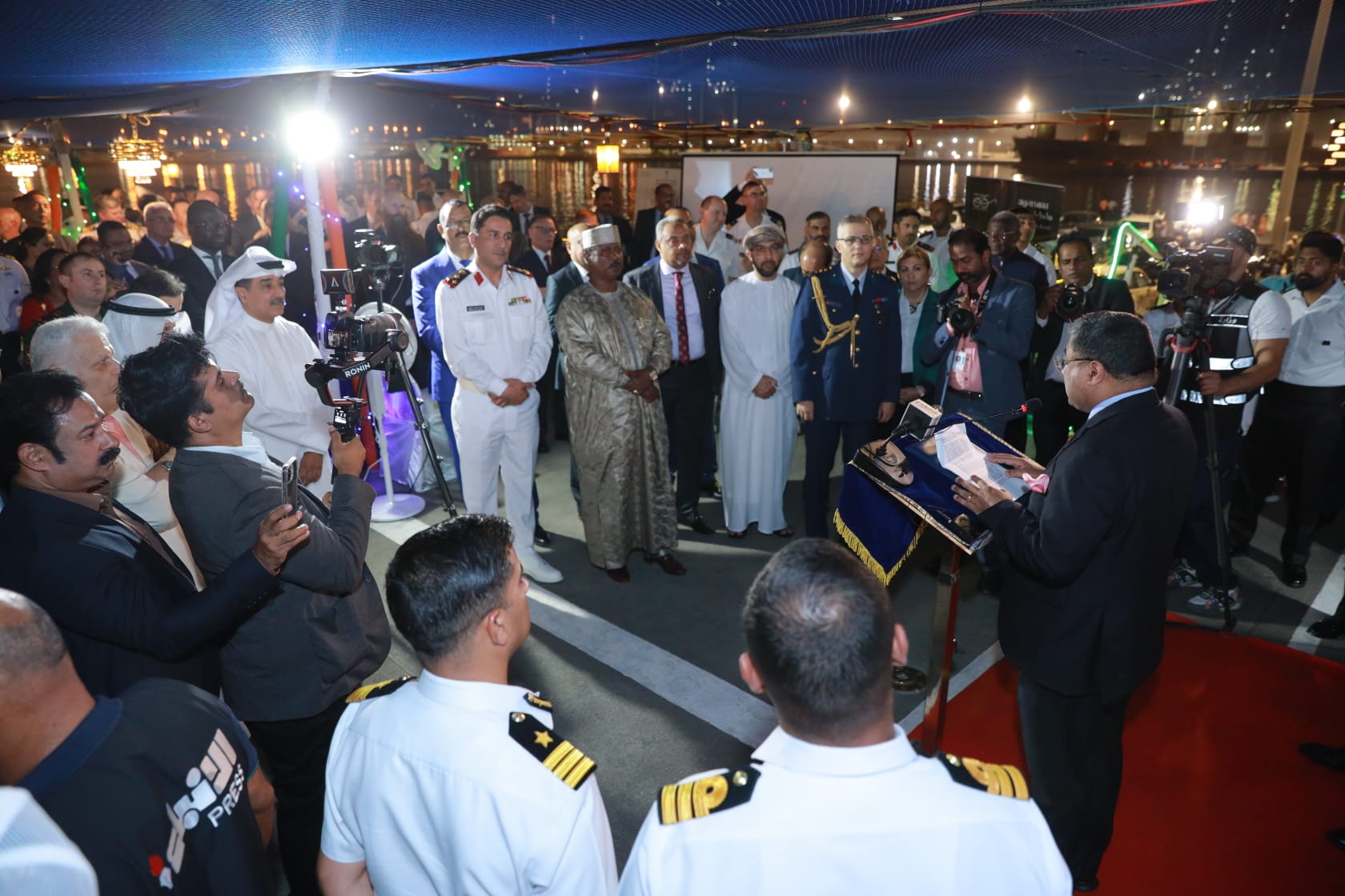 Indian Ambassador Sibi George addresses the gathering during a reception on board INS TIR at Shuwaikh Port on Wednesday.