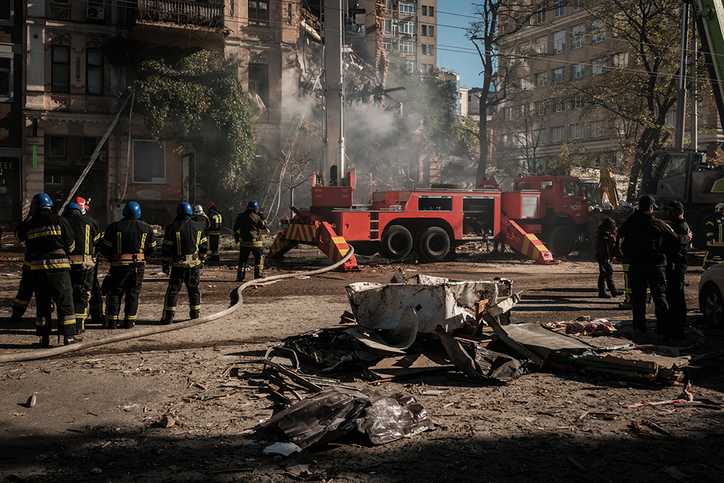KYIV, Ukraine: Ukrainian firefighters works on a destroyed building after a drone attack in Kyiv on October 17, 2022, amid the Russian invasion of Ukraine. - AFP