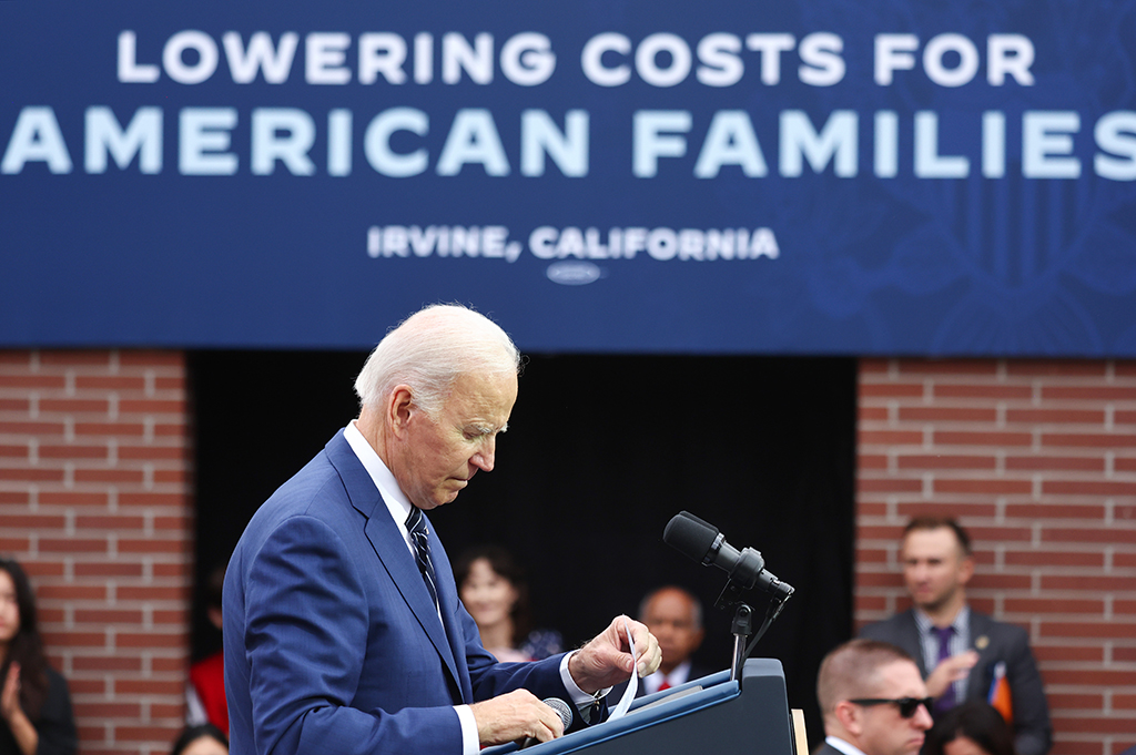 IRVINE, US: US President Joe Biden stands after delivering remarks on lowering costs for American families at Irvine Valley College in Orange County on October 14, 2022 in Irvine, California. -- AFP