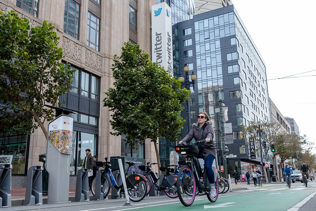 CALIFORNIA: A bicyclist passes by Twitter headquarters in San Francisco, California. After months of controversy, Elon Musk is now at the head of one of the most influential social networks on the planet, whose 'tremendous potential' he has promised to unleash. - AFP