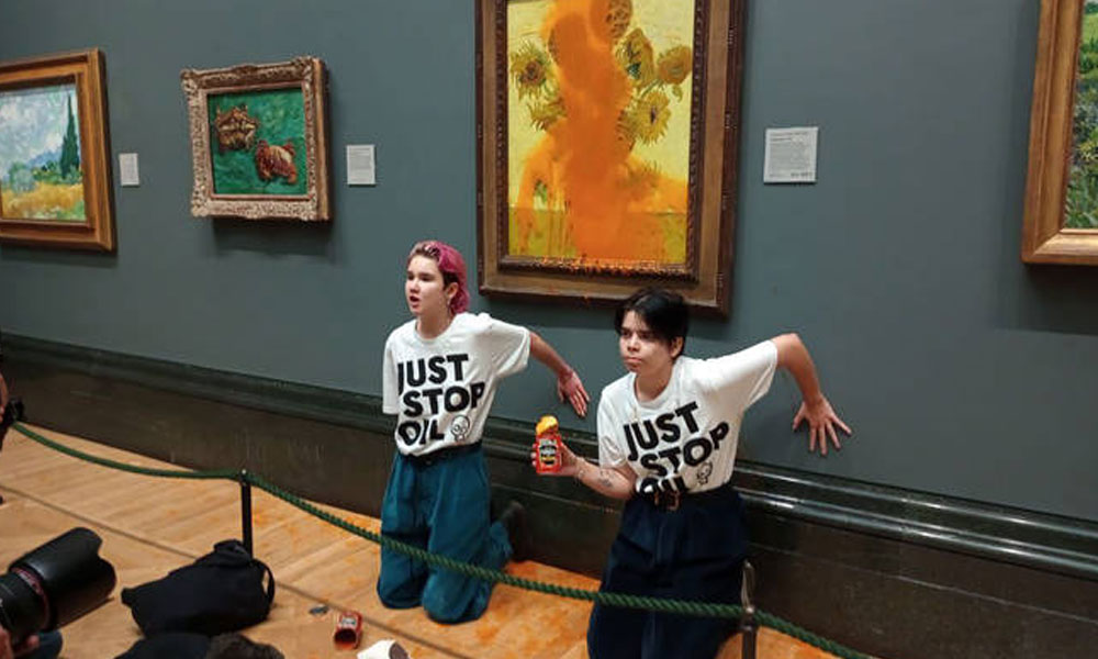 Just Stop Oil protesters throw soup at Van Gogh's Sunflowers painting