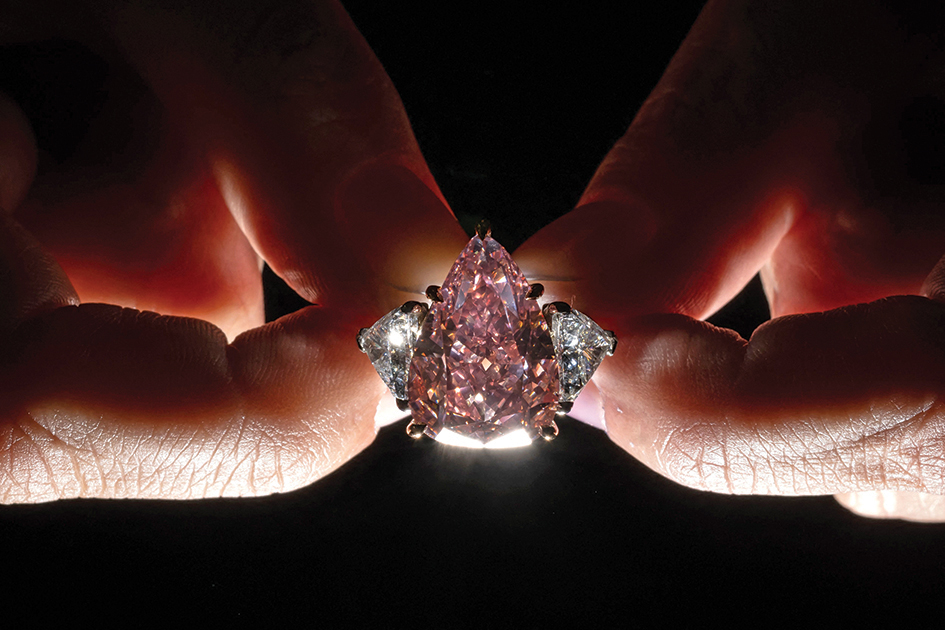 This file photo taken in Geneva shows the Fortune Pink, an exceptionally rare giant gemstone, that is expected to bring in up to $35 million when it will comes up for sale in Geneva by Christie’s auction house.— AFP