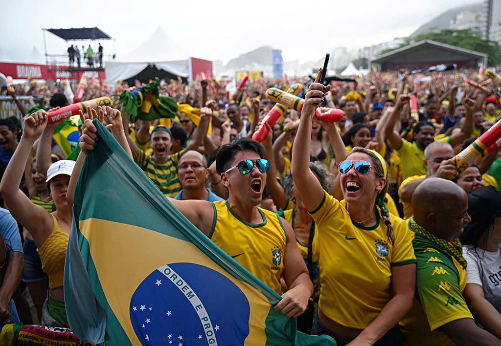 In this file photo fans of Brazil watch the live broadcast of the Qatar 2022 World Cup Group G football match between Brazil and Switzerland, at the FIFA Fan Fest in Copacabana beach, Rio de Janeiro, Brazil.— AFP photos