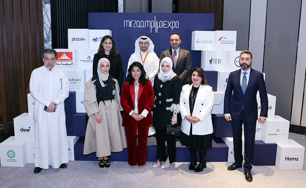 Farah Al-Humaidhi with representatives of sponsons of the expo.