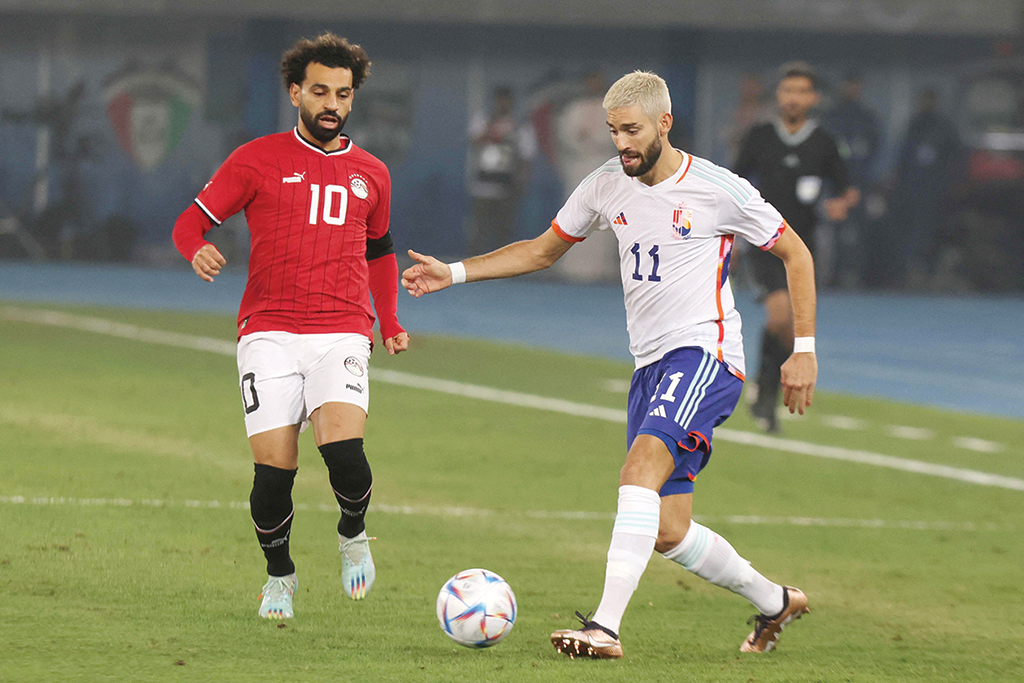 KUWAIT CITY: Egypt's forward Mohamed Salah (L) and Belgium's midfielder Yannick Carrasco vie for the ball during the friendly football match between Belgium and Egypt at the Jaber Al-Ahmad Stadium in Kuwait City. 