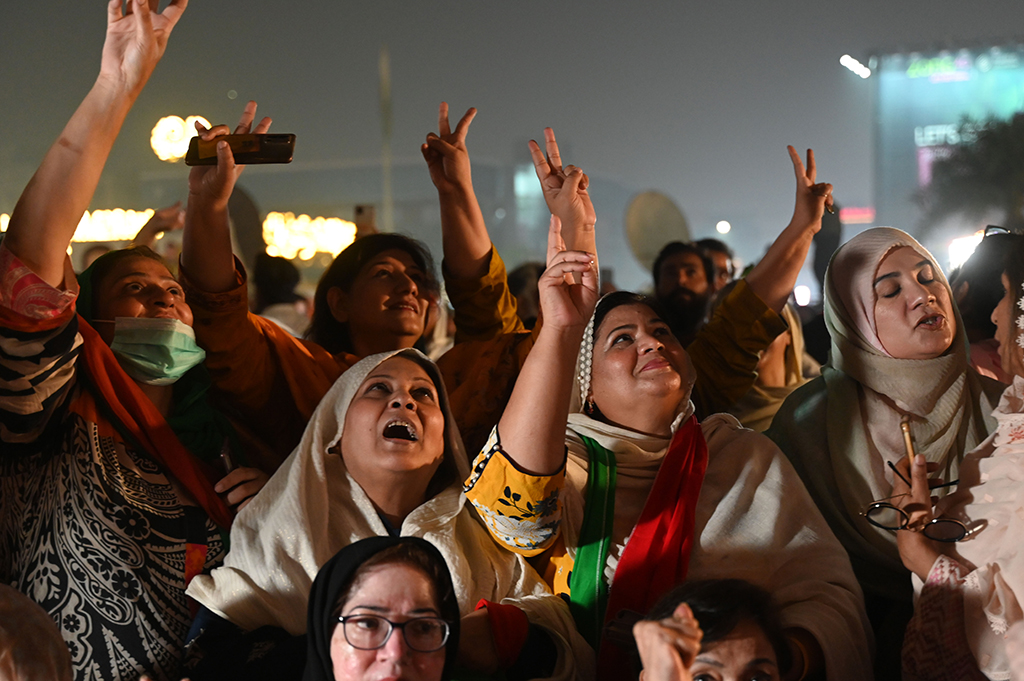 LAHORE: Supporters of former Pakistani prime minister Imran Khan, gather in a protest against the assassination attempt on Khan during a long march, in Lahore. – AFP