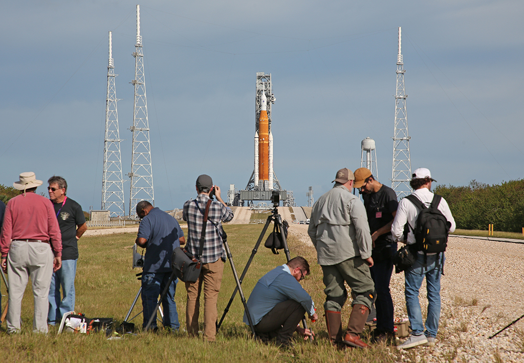 CAPE CANAVERAL: Photographers set up remote cameras as the Artemis I unmanned lunar rocket sits on launch pad 39B at NASA's Kennedy Space Center in Cape Canaveral, Florida. NASA said it plans to attempt its long-delayed uncrewed mission to the Moon as scheduled on November 16. - AFP