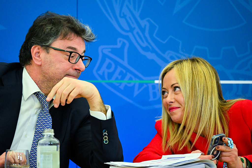 ROME: Italy's Prime Minister Giorgia Meloni and Italy's Economy Minister, Giancarlo Giorgetti react during a press conference on November 22, 2022 in Rome, to present the government's draft Budget for 2023. - AFP