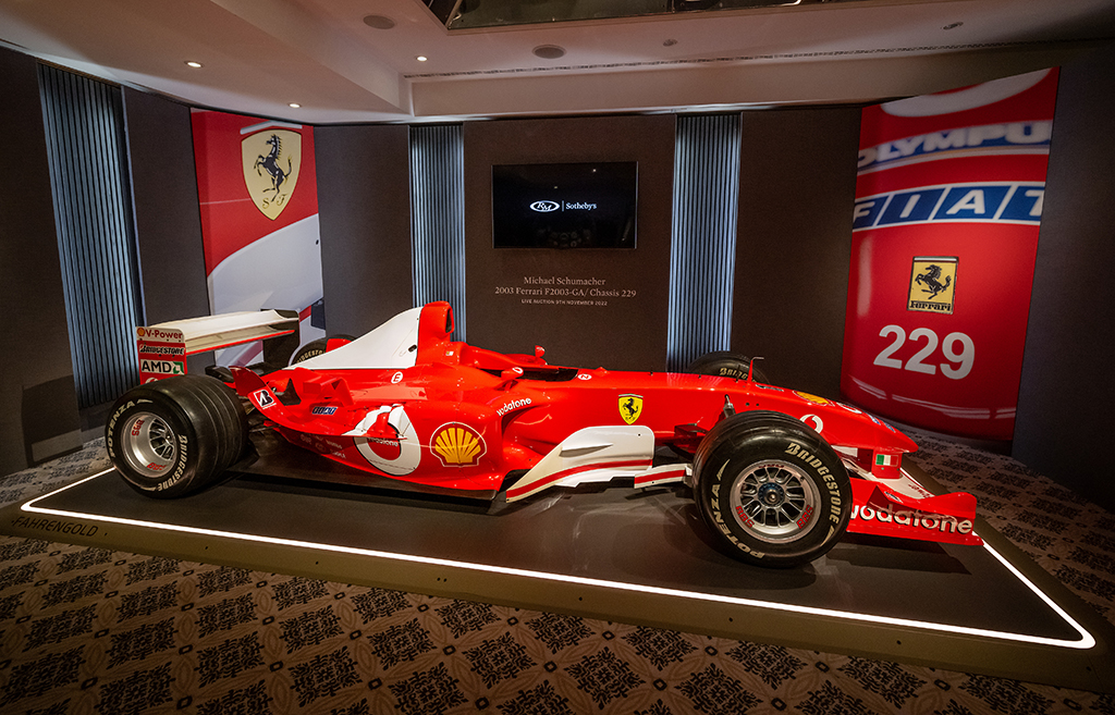 GENEVA: Photograph shows F1 World Champion Michael Schumacher’s Formula One Ferrari F2003 GA with chassis number 229 during Sotheby’s auction house preview in Geneva. – AFP