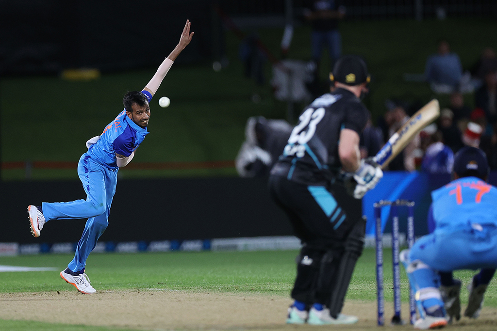NAPIER: India's Yuzvendra Chahal (left) bowls to New Zealand's Glenn Phillips (right) during the third Twenty20 cricket match between New Zealand and India at McLean Park in Napier on November 22, 2022. - AFP