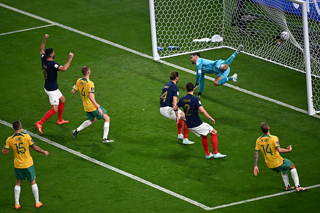 AL-WAKRAH: France’s midfielder #14 Adrien Rabiot (out of frame) heads the ball to score his team’s first goal as Australia’s goalkeeper #01 Mathew Ryan (center) fails to stop it during the Qatar 2022 World Cup Group D football match between France and Australia on November 22, 2022. – AFP