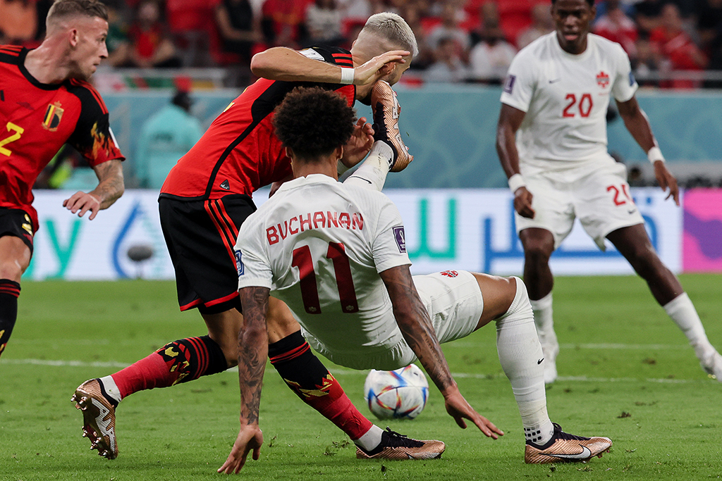 DOHA: Canada's forward #11 Tajon Buchanan fights for the ball with Belgium's midfielder #11 Yannick Carrasco during the Qatar 2022 World Cup Group F football match between Belgium and Canada on November 23, 2022. - AFP