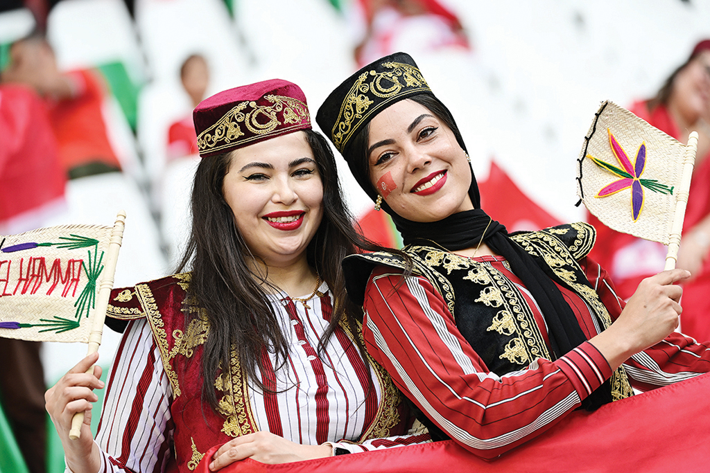 Fans attend the Qatar 2022 World Cup Group D football match between Denmark and Tunisia at the Education City Stadium in Al-Rayyan.