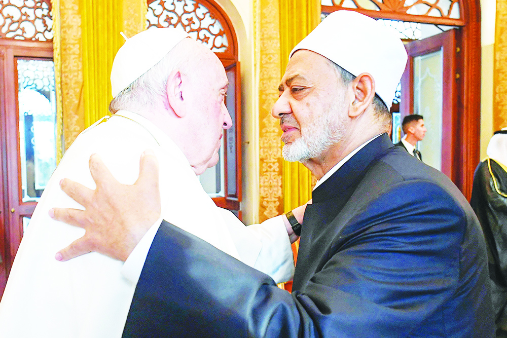 Pope Francis embraces the Grand Imam of Al-Azhar Mosque Sheikh Ahmed Al-Tayeb during their meeting at the papal residence near Sakhir Royal Palace in the eponymous Bahraini city on Nov 4, 2022. — AFP