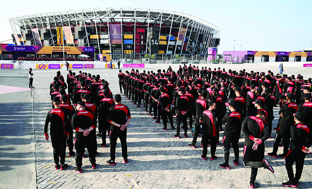 DOHA: Guards stand outside the Stadium 974 on Nov 15, 2022, ahead of the Qatar 2022 World Cup. - AFP