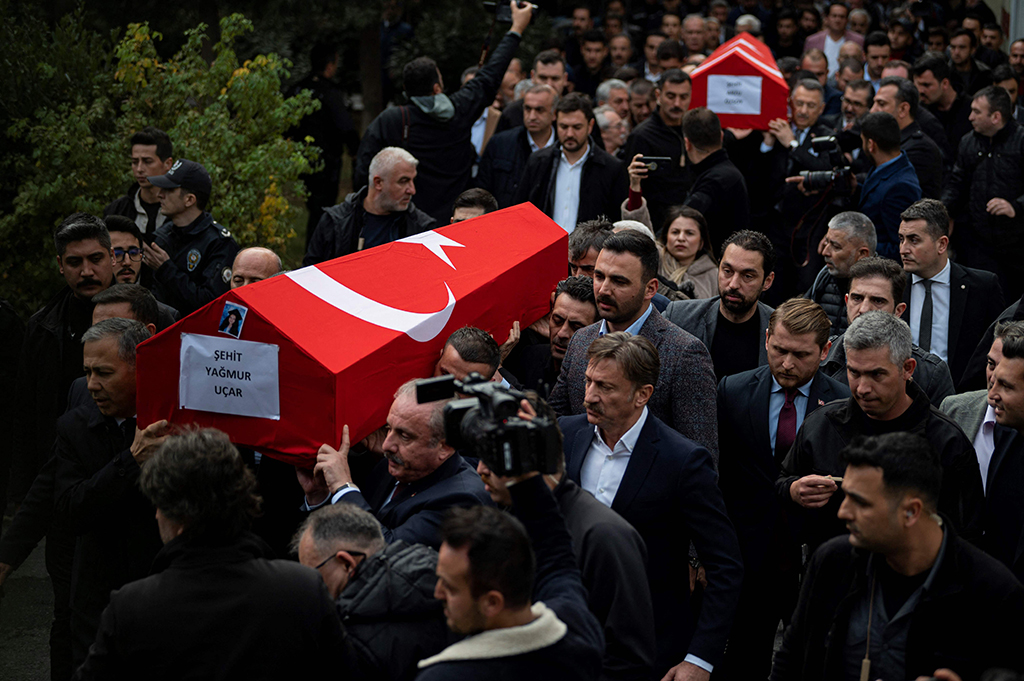 ISTANBUL: People carry coffins of Yagmur Ucar and Arzu Ozsoy during funeral ceremonies of people who lost their lives after the explosion on Istiklal Street, in Istanbul on November 14, 2022. – AFP