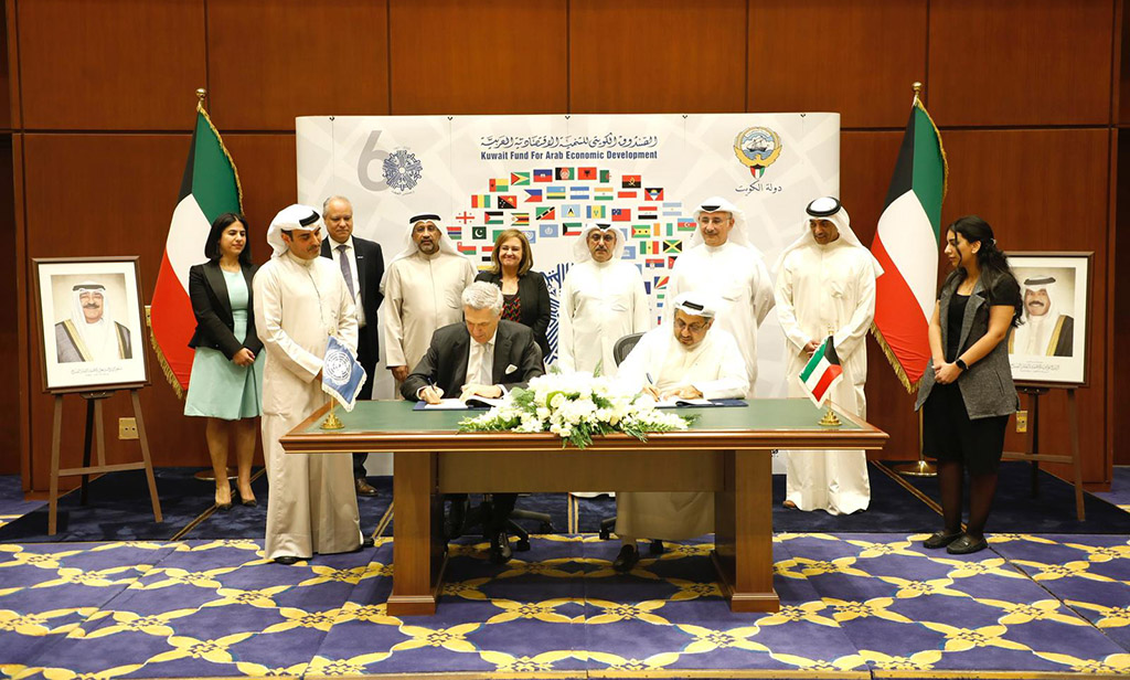 KUWAIT: KFAED and UNHCR officials sign the deal.