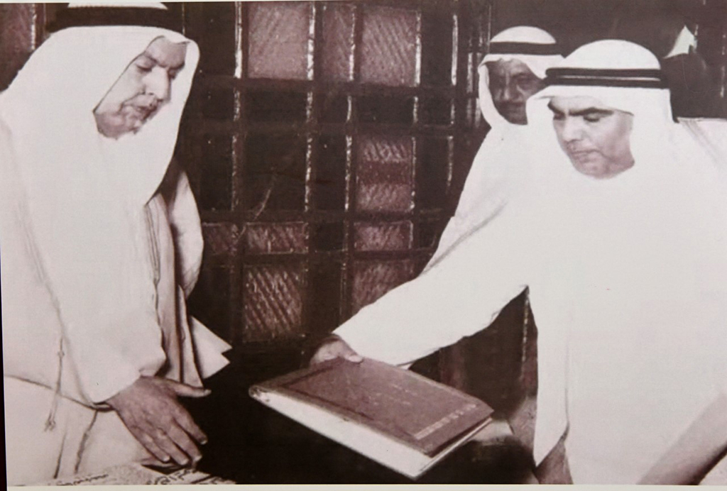 President of the Constituent Assembly hands over Kuwaiti Constitution to HH the Amir.
