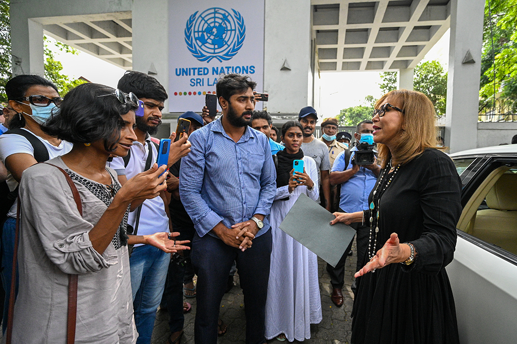 COLOMBO: Anti-government demonstrators and university students speak with UN Resident Coordinator in Sri Lanka, Hanaa Singer-Hamdy (right) before protesting to demand the release of their leaders outside the United Nations (UN) office in Colombo. - AFP