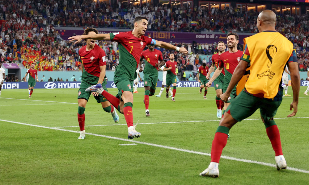 Portugal's forward #07 Cristiano Ronaldo celebrates after scoring his team's first goal from the penalty spot