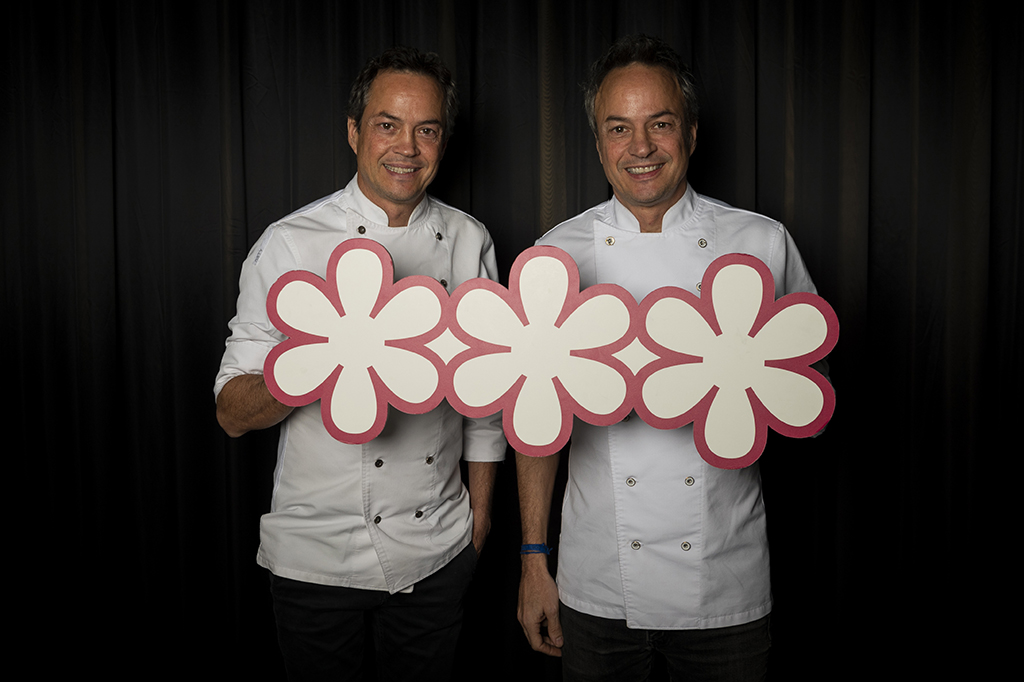 Spanish twin chefs, Javier (left) and Sergio Torres pose in the kitchen of their restaurant 'Cocina Hermanos Torres' after receiving the distinction of three-stars from the Michelin guide, in Barcelona. - AFP photos