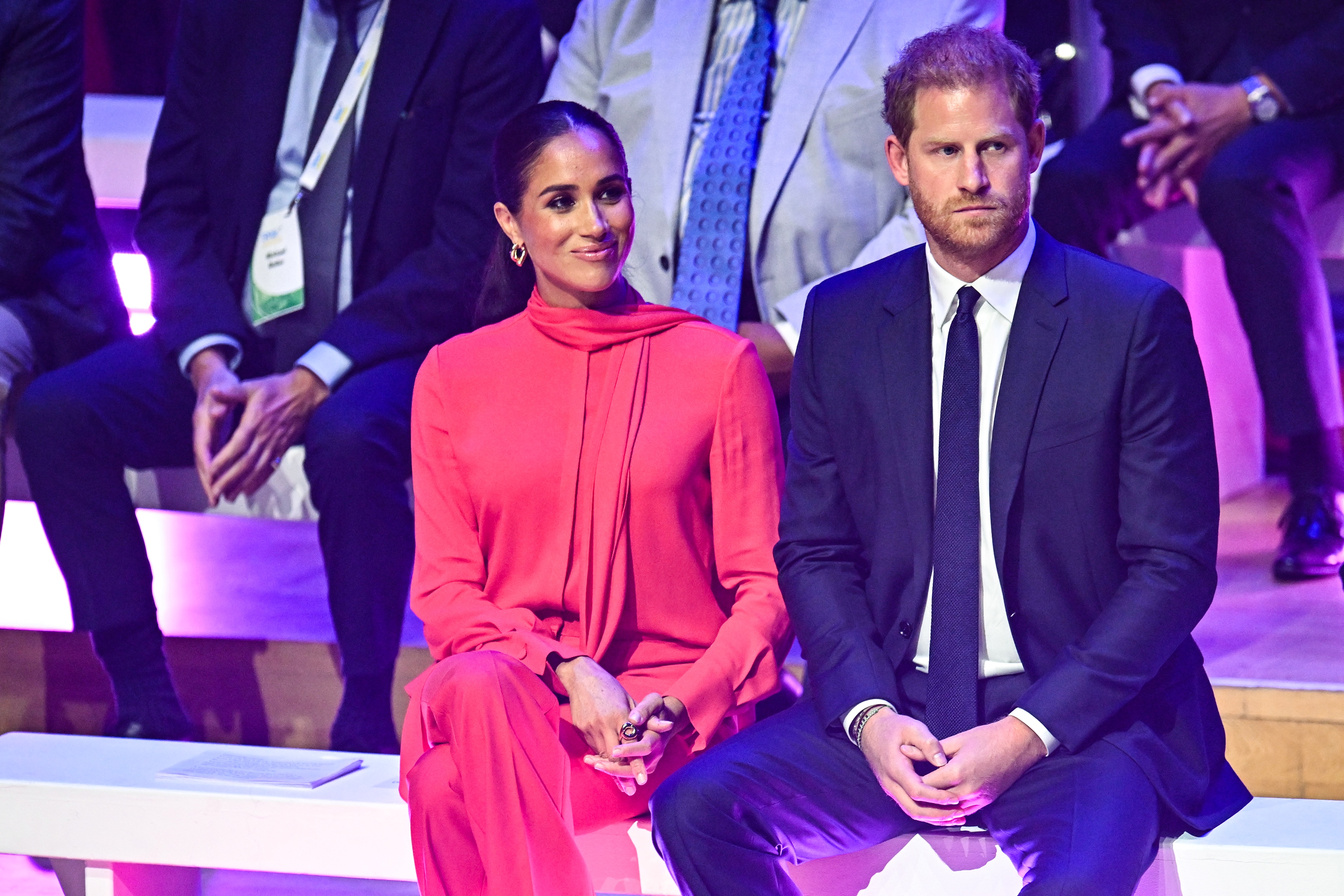 Britain's Meghan, Duchess of Sussex (L) and Britain's Prince Harry, Duke of Sussex, attend the annual One Young World Summit at Bridgewater Hall in Manchester, north-west England on September 5, 2022. - The One Young World Summit is a global forum for young leaders, bringing together young people from over 190 countries around the world to come together to confront the biggest challenges facing humanity. (Photo by Oli SCARFF / AFP)