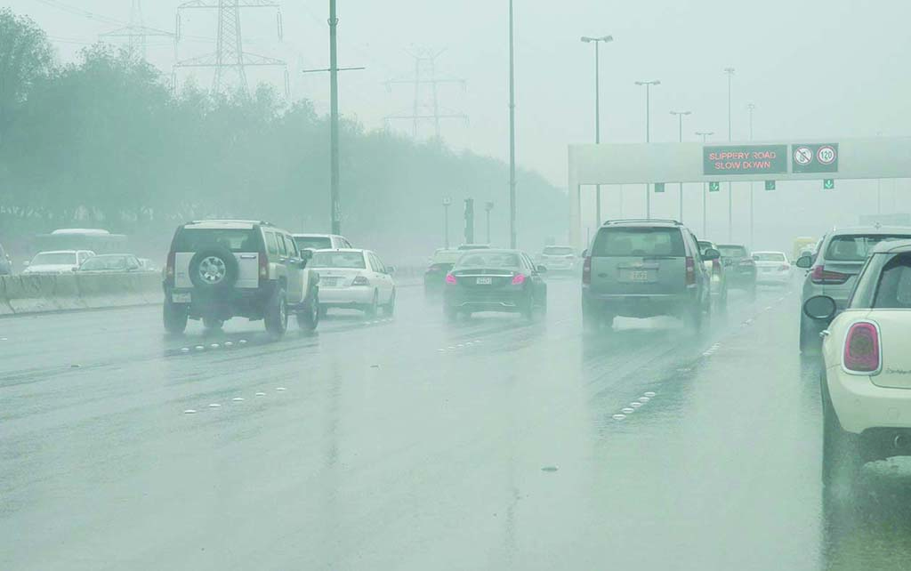 KUWAIT: Motorists drive amid heavy rain and low visibility on Dec 6, 2022. - Photo by Fouad Al-Shaikh