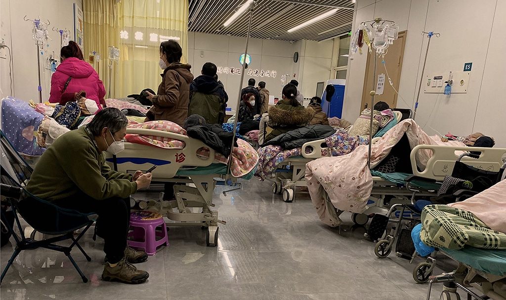 TIANJIN: Picture shows COVID-19 patients on beds at Tianjin Nankai Hospital in Tianjin on December 28, 2022. Cities across China have struggled with surging infections, a resulting shortage of pharmaceuticals and overflowing hospital wards and crematoriums after Beijing suddenly dismantled its zero-COVID lockdown and testing regime. – AFP