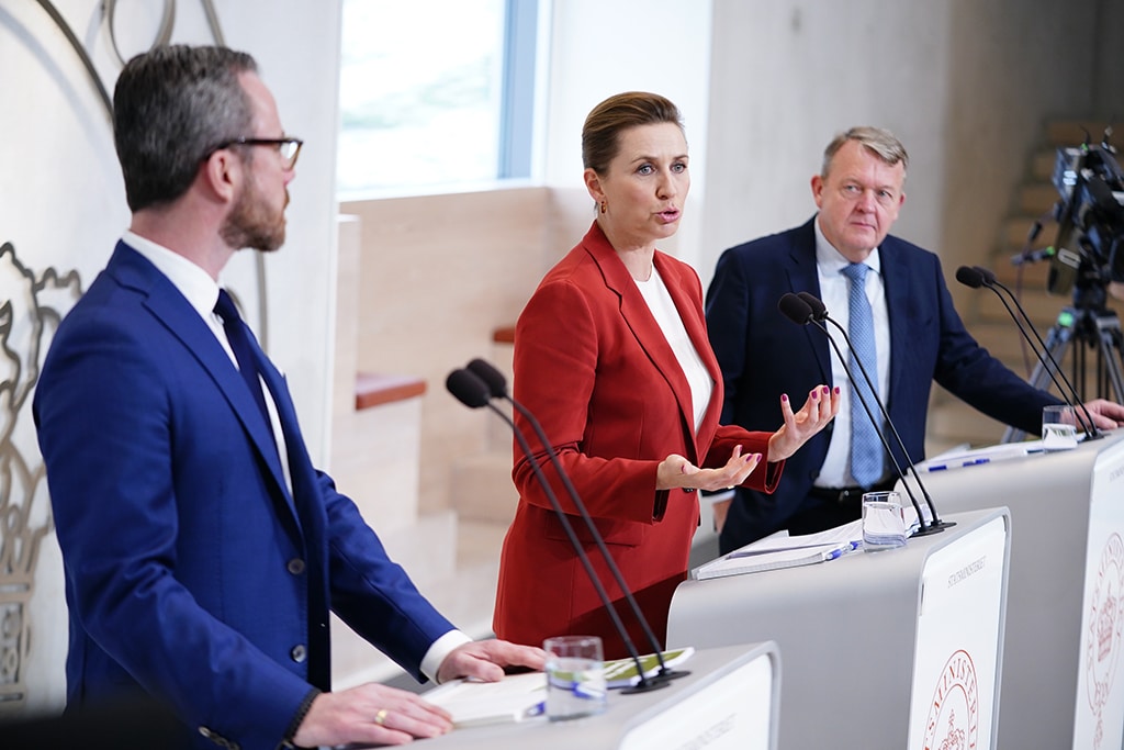 KONGENS LYNGBY, Denmark: Danish Prime Minister and leader of The Social Democrats, Mette Frederiksen (C) together with the leader of The Moderates party Lars Lokke Rasmussen (R) and the chairman of Denmark's Liberal Party Venstre, Jakob Ellemann-Jensen (L) address a press conference to present a new government. – AFP