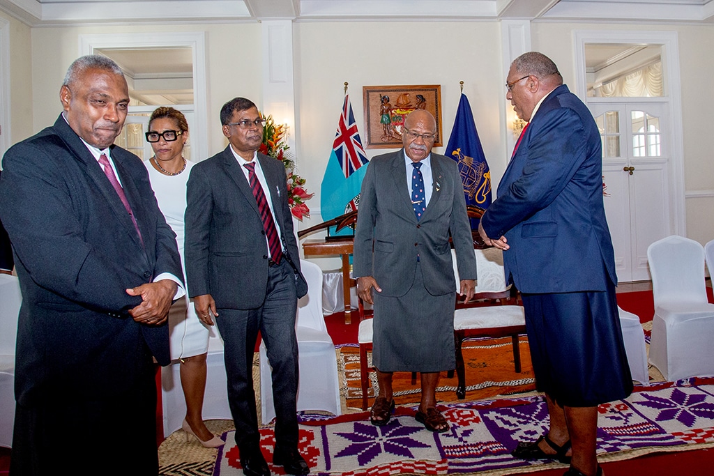 SUVA: Fiji's President Ratu Wiliame Katonivere (R) talks to newly elected Prime Minister Sitiveni Rabuka (2nd R) and cabinet ministers after an oath-taking ceremony in the capital city Suva on December 24, 2022. – AFP