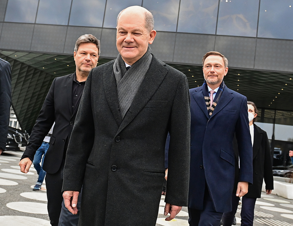 BERLIN: File photo shows the designated German Chancellor Olaf Scholz (C), co-leader of the Greens and then designated German Minister for Economy and Climate Robert Habeck (L) and the leader of the Free Democratic FDP party and then designated German Finance Minister Christian Lindner (R) leave the Futurium venue after a signing ceremony in Berlin. – AFP