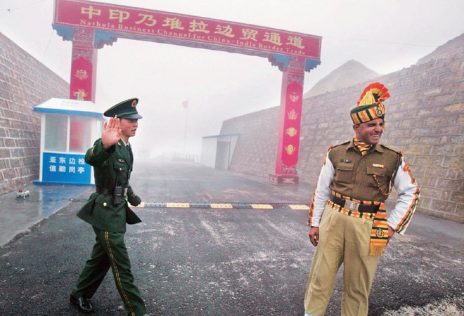 Indian and Chinese troops exchanging pleasantries at the border.