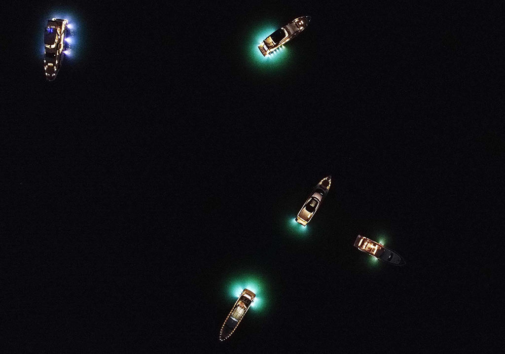 KUWAIT: Aerial view shows private boats sailing at night in Gulf waters, off the shore of Kuwait City. - Photo by Yasser Al-Zayyat