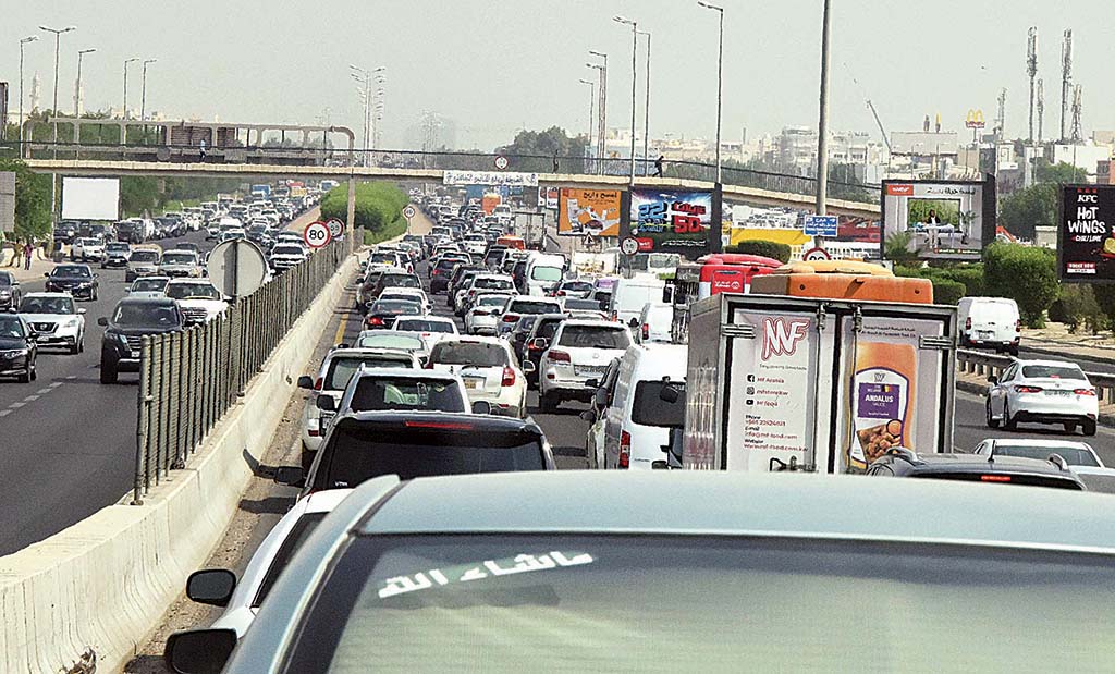 KUWAIT: Vehicles move bumper-to-bumper on a busy morning in Kuwait City. – Photo by Fouad Al-Shaikh
