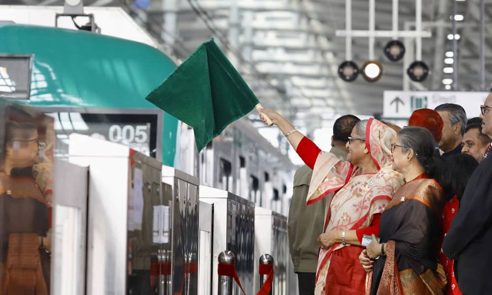 Bangladesh's Prime Minister Sheikh Hasina (L) attends an inauguration ceremony of the metro rail service in Dhaka on December 28, 2022.