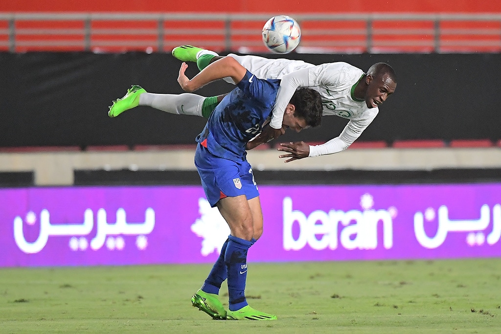 MURCIA: In this file photo, Saudi Arabia’s defender Saud Abdulhamid (top) vies with US midfielder Gio Reyna during the friendly football match between Saudi Arabia and United States at the Nueva Condomina stadium. – AFP