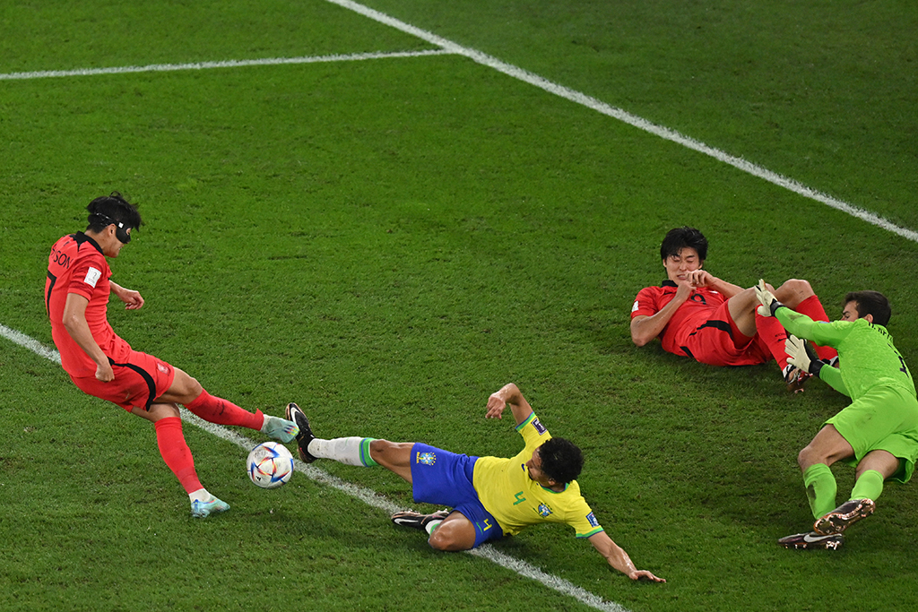 DOHA: South Korea’s midfielder #07 Son Heung-min shoots but fails to score during the Qatar 2022 World Cup round of 16 football match between Brazil and South Korea on December 5, 2022. – AFP