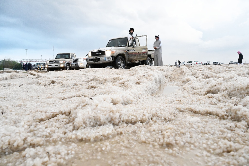 KUWAIT: The ground is packed with hailstones after a hailstorm in Umm al-Haiman on Dec 27, 2022. — Photos by Yasser Al-Zayyat