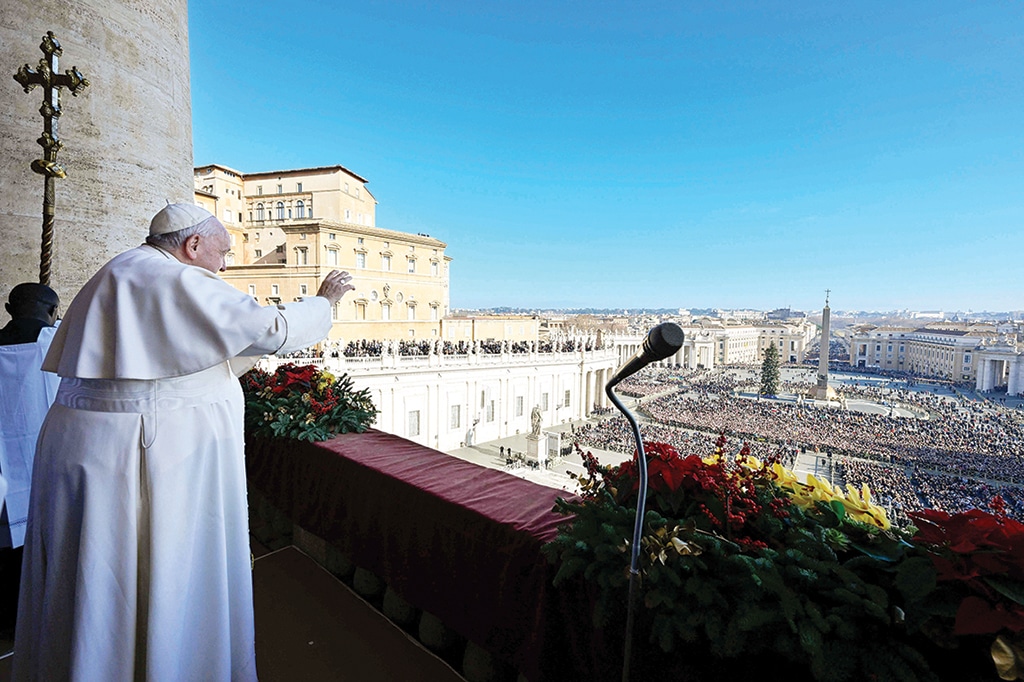 VATICAN CITY: Pope Francis delivers his Christmas 'Urbi et Orbi' blessing from a balcony overlooking St Peter's Square on Dec 25, 2022. - AFP
