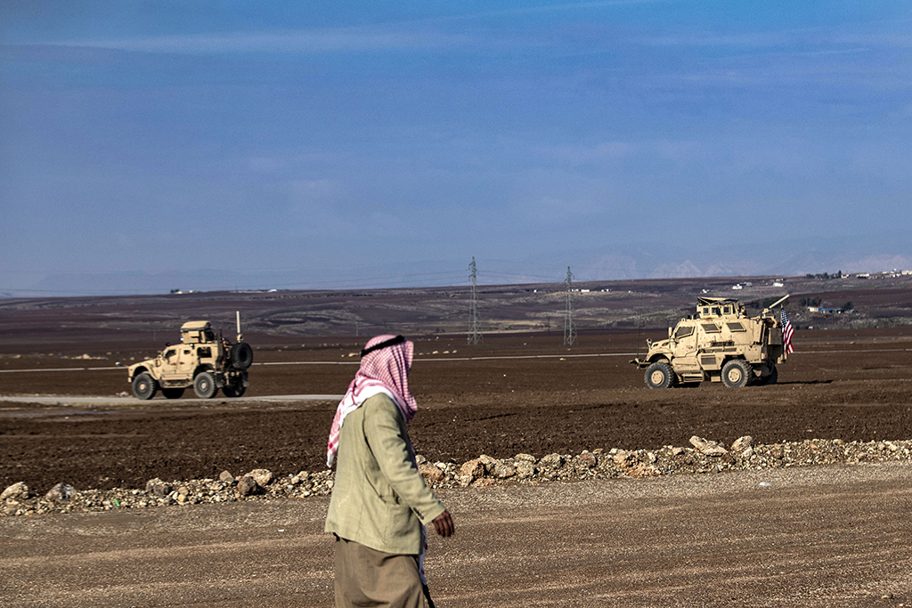 RUMAYLAN, Syria: US forces patrol near the countryside of Rumaylan (Rmeilan) in Syria's northeastern Hasakeh province near the Turkish border, on December 2, 2022. – AFP