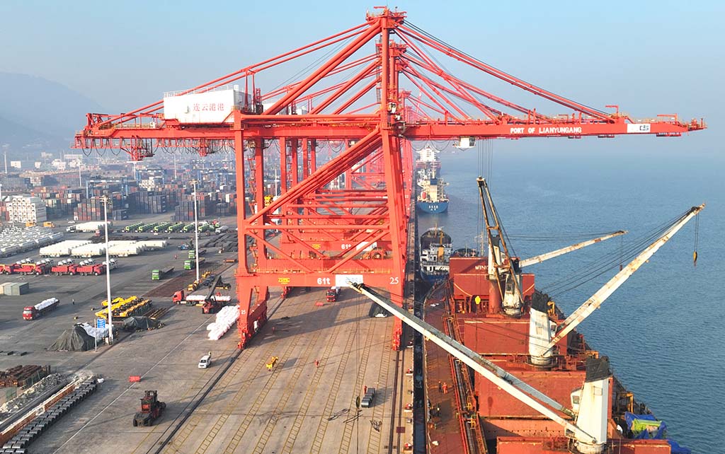 LIANYUNGANG, China: This photo taken on December 7, 2022 shows cranes and shipping containers at a port in Lianyungang in China's eastern Jiangsu province. – AFP