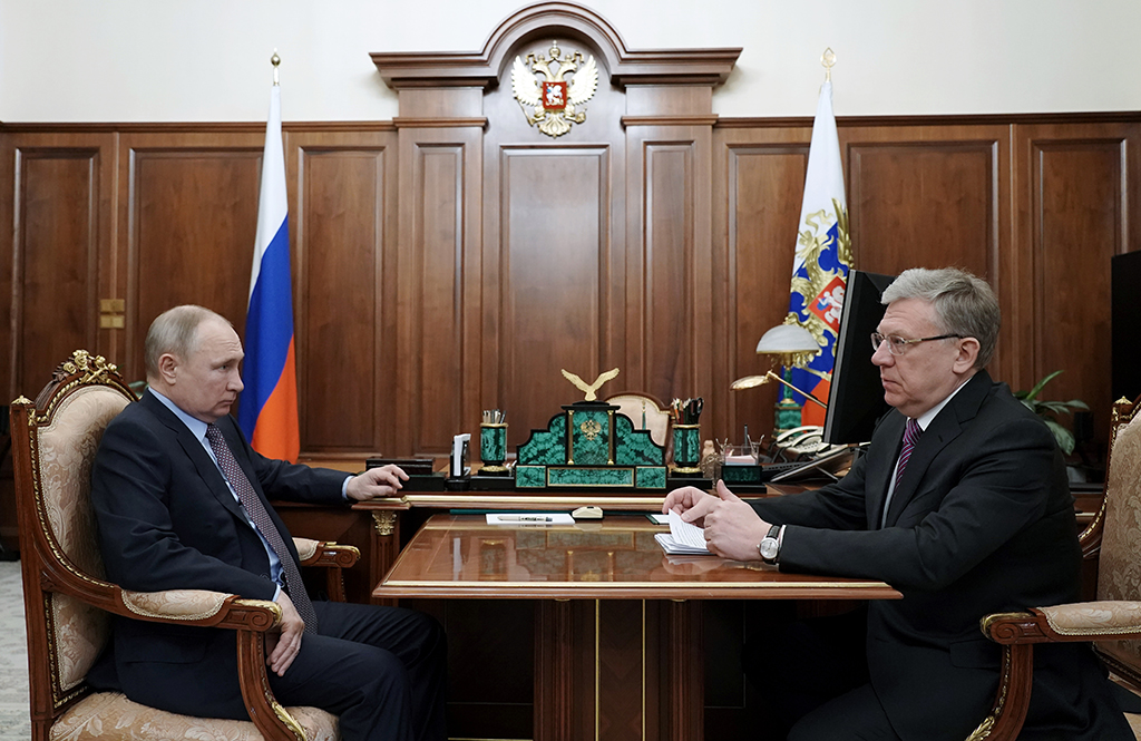 MOSCOW: In this file photo taken on March 23, 2021 Russian President Vladimir Putin meets with the Audit Chamber head Alexei Kudrin at the Kremlin in Moscow. – AFP