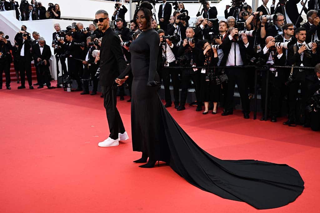 In this file photo French-Malian singer Aya Nakamura (right) and her partner Vladimir Boudnikoff arrive for the screening of the film “Armageddon Time” during the 75th edition of the Cannes Film Festival in Cannes, southern France.— AFP  