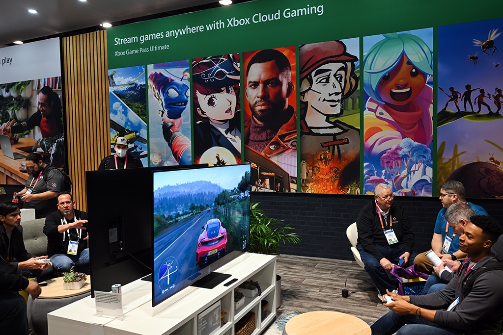 LAS VEGAS: Attendees play video games via Xbox cloud gaming at the Microsoft Inc. booth during the Consumer Electronics Show (CES) in Las Vegas, Nevada on January 6, 2023. – AFP