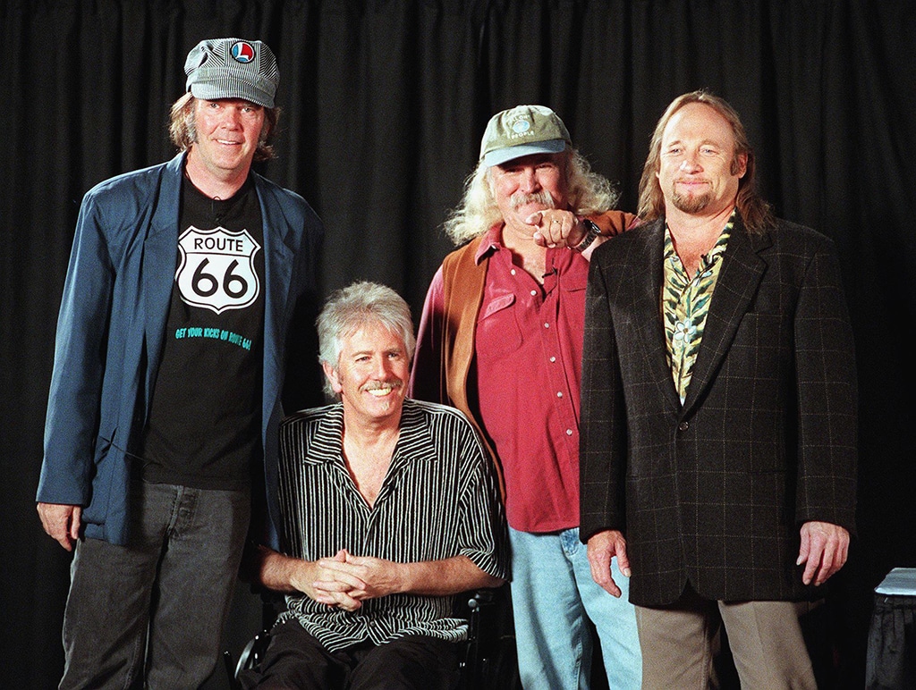 File photo taken on October 11, 1999 David Crosby (2nd from R) points to an audience member while posing for a photo with once and future bandmates Stephen Stills (R), Graham Nash (2nd from L) and Neil Young before a news conference in New York. - AFP photos